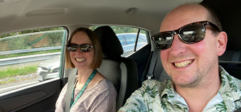 Two colleagues in a car