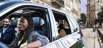 woman driving with window down