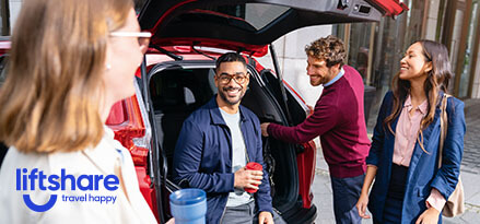 4 people by a car boot with liftshare logo