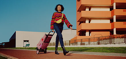 Person walking with personal shopping trolley