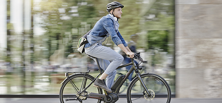 Person cycling on bike